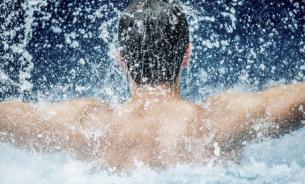 Man jumping in water